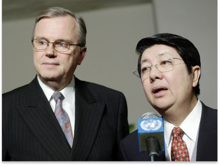 Photo Description: Hans Corell (left), UN Legal Council, and Sok An (right), the Cambodian Senior Minister and Head of the Council of Ministers, addressing correspondents at the Council of Ministers at the UN Headquarters in New York on February 2, 2005.