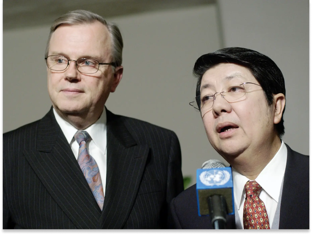 Photo Description: Hans Corell (left), UN Legal Council, and Sok An (right), the Cambodian Senior Minister and Head of the Council of Ministers, addressing correspondents at the Council of Ministers at the UN Headquarters in New York on February 2, 2005.